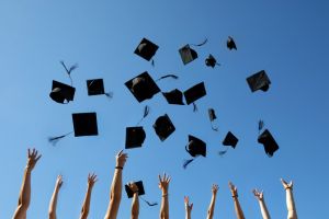 throwing graduation caps in the air