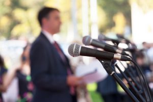 microphone with man in background